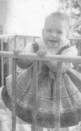 Standing up in her crib